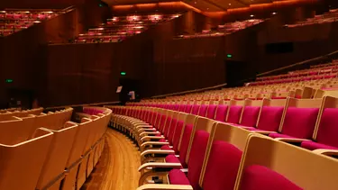 Empty magenta seats in the Concert Hall at Sydney Opera House.