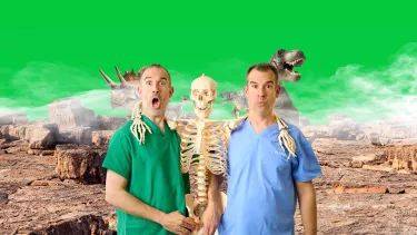 Two men and a skeleton look surprised. There are dinosaurs and mist in the background.