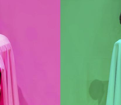 Two individuals dressed in monochromatic outfits sit on pedestals; one in pink with a crown on the left, and one in green with a crown on the right, both in similar regal poses against matching backgrounds.